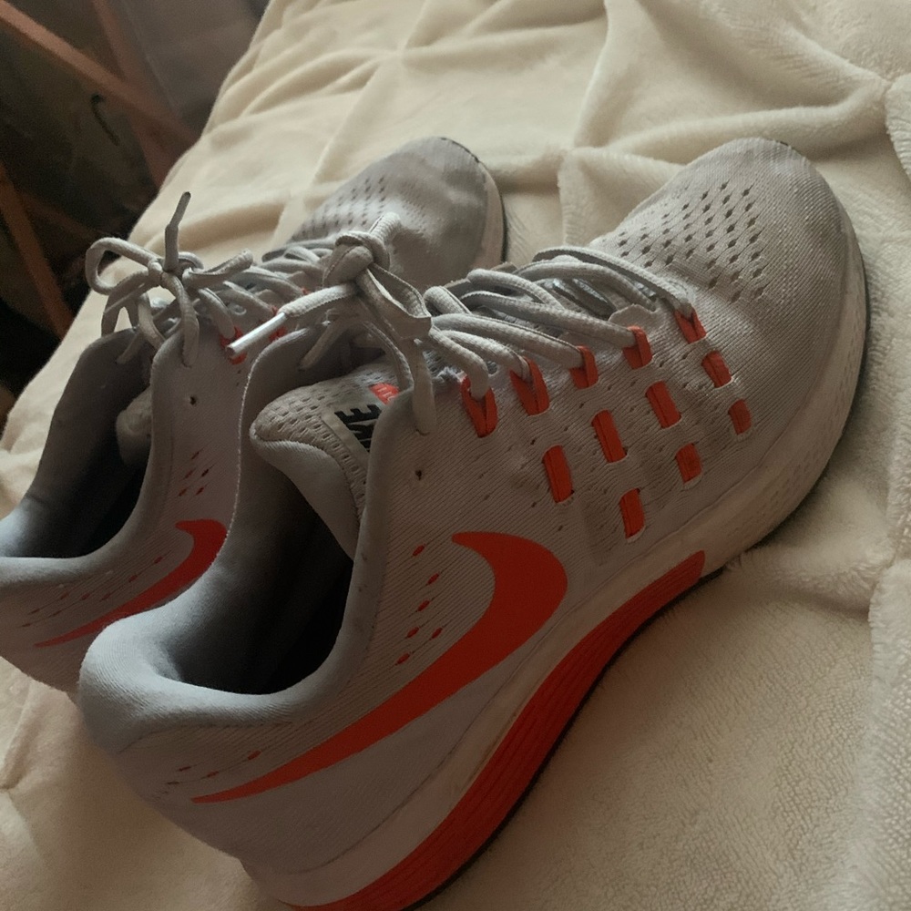 Orange Nike shoes